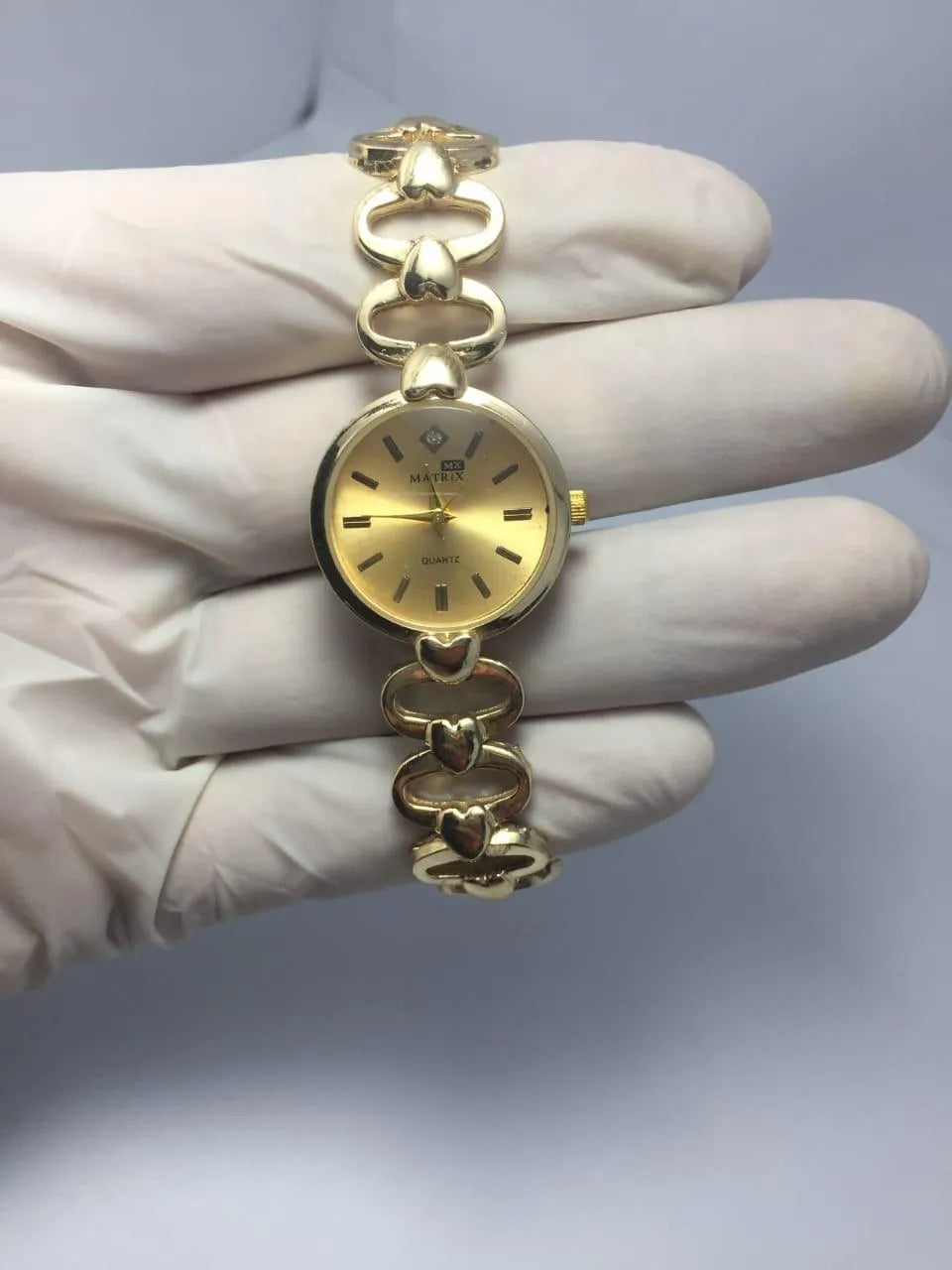 Gold Quartz Watch with Diamond Dial & Three-Hand Display